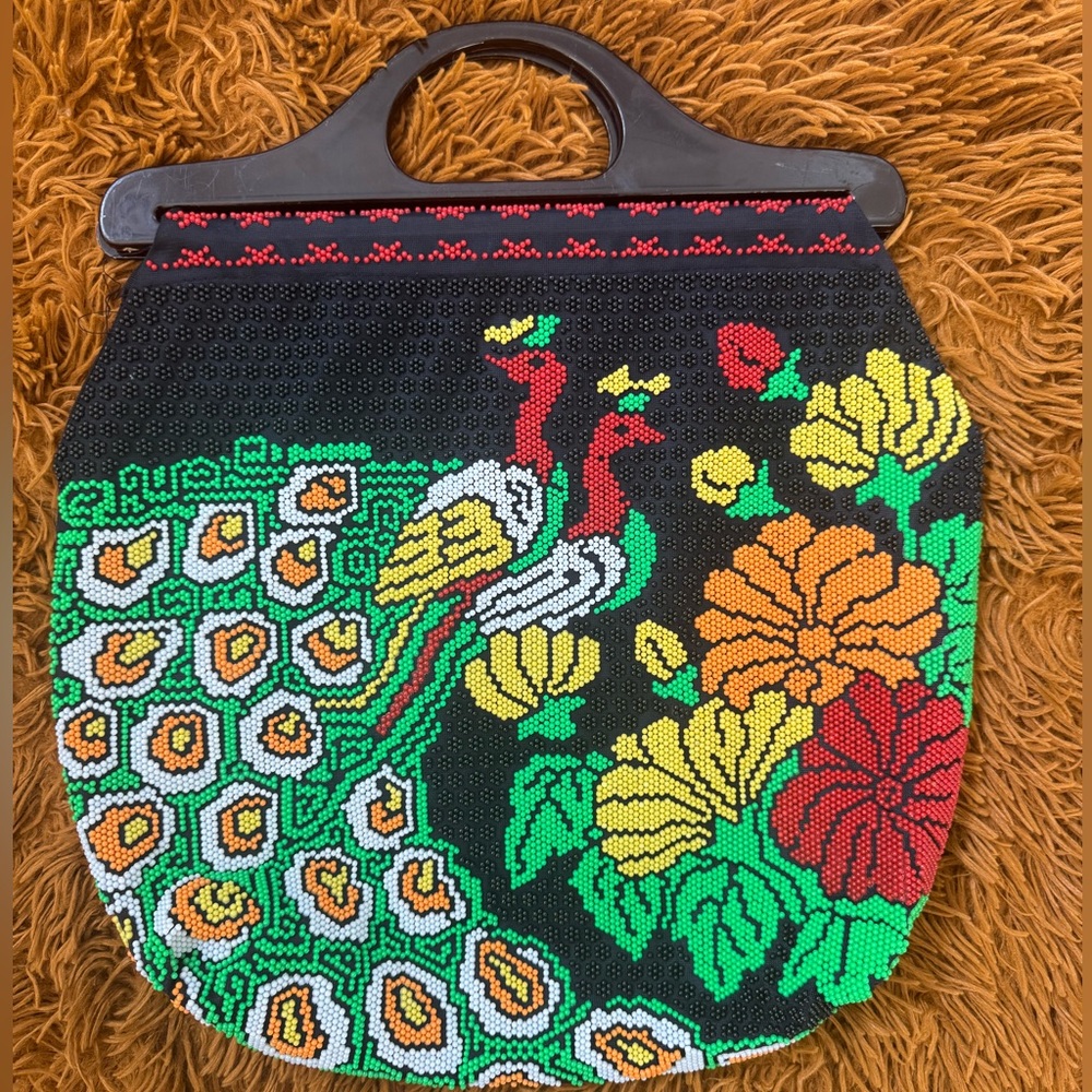 Peacock clutch